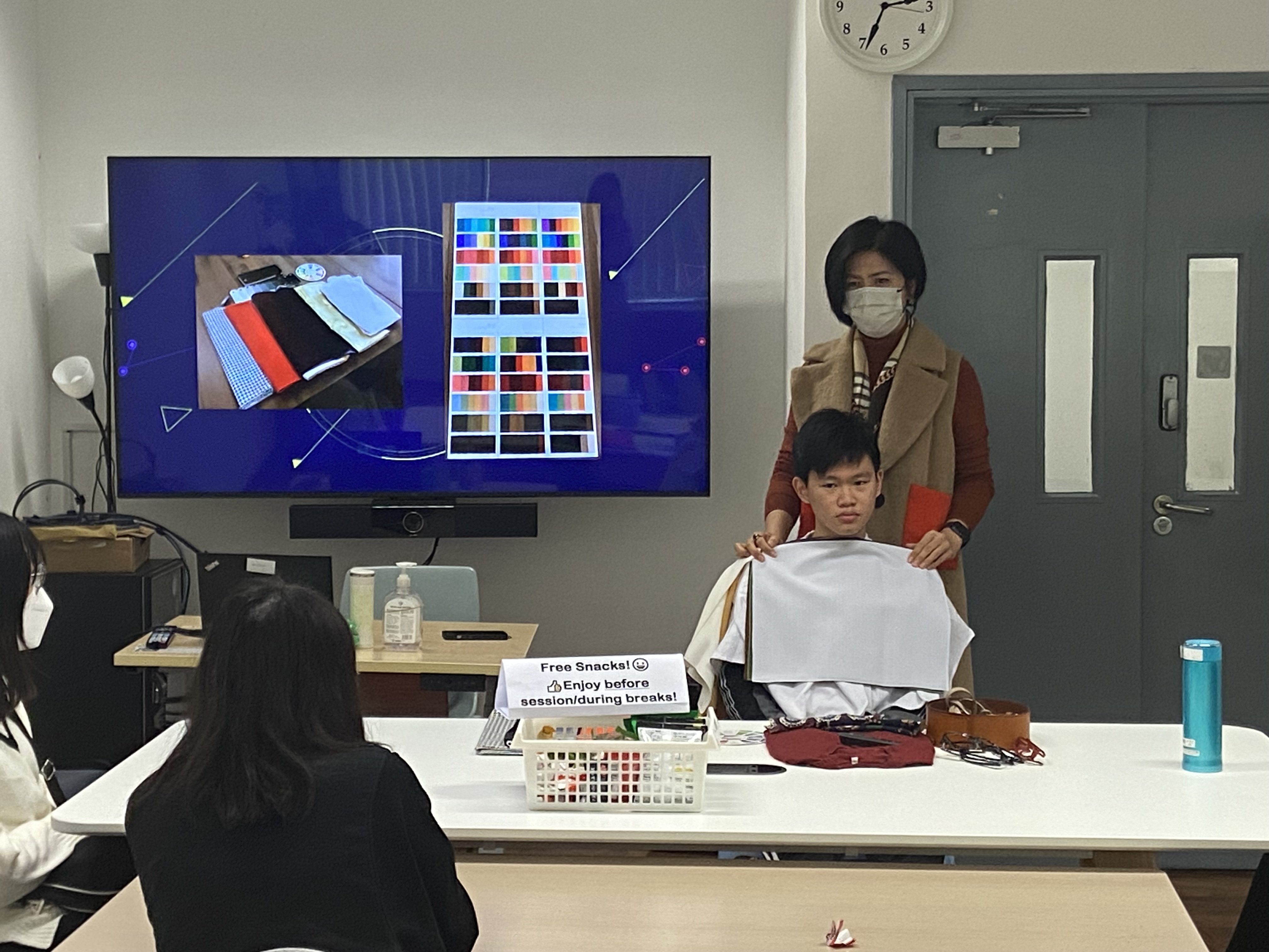 Tutor is introducing the concept of colour matching. 