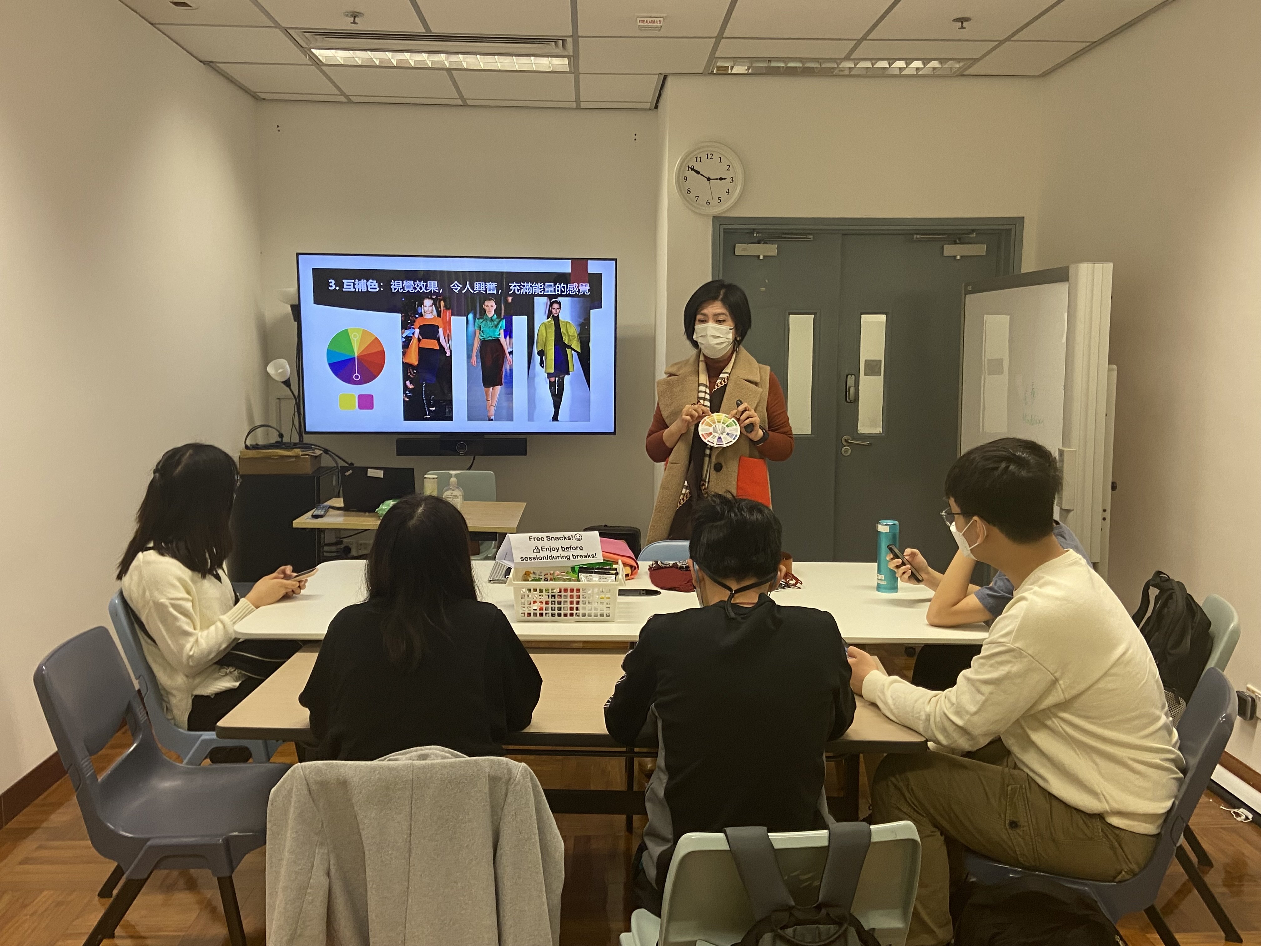 Tutor is introducing the concept of colour matching. 